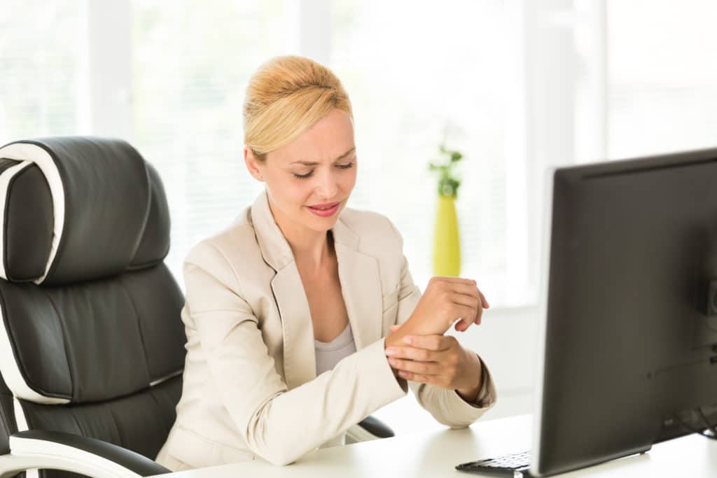 Woman with Repetitive Stress Injury to her wrist