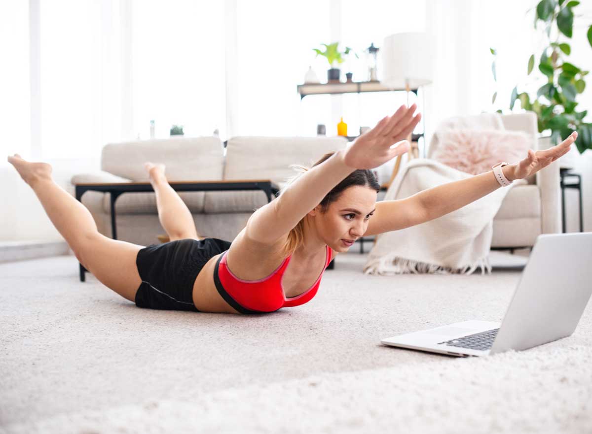 Woman doing the Superman pose.