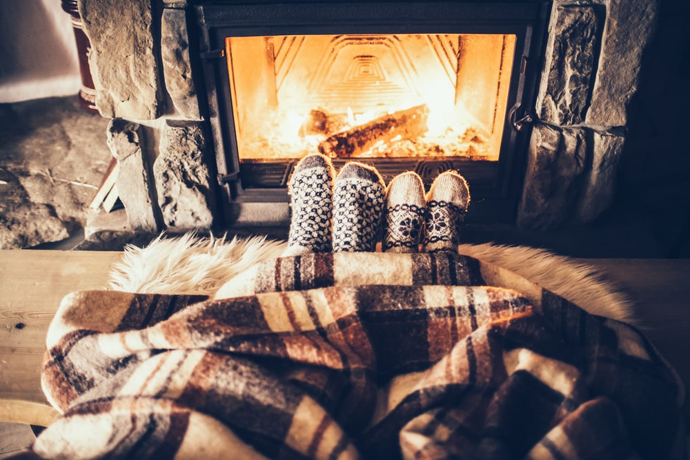 Cozy winter self-care by the fireplace