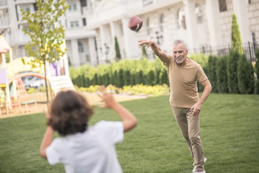 Grandpa playing ball with grandson